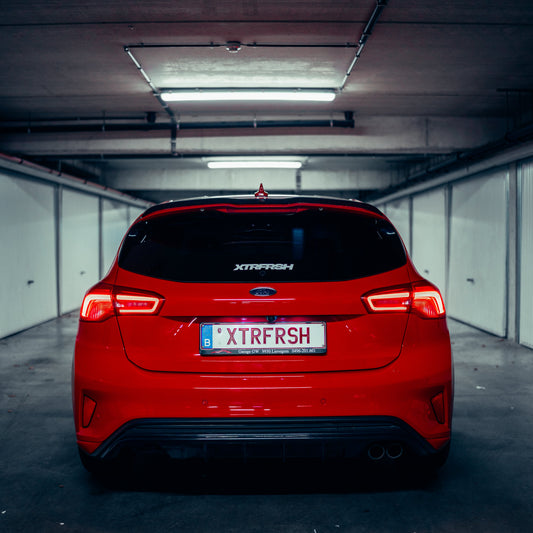 XTRFRSH bold sticker on a car window.